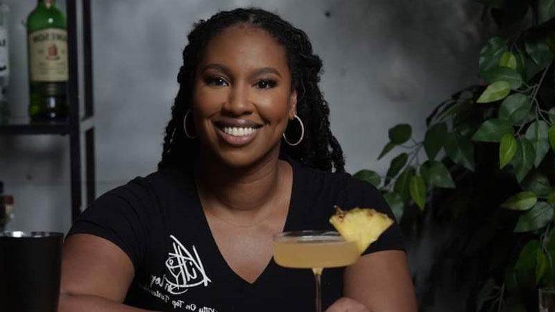 Woman, Penn State Abington(near Philadelphia) graduate, holding a drink 